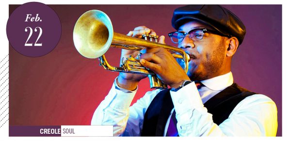 Etienne Charles playing a trumpet 