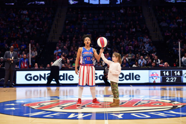 woman from Harlem Globetrotters, little girl