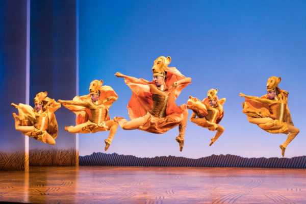 The Lion King dancers onstage